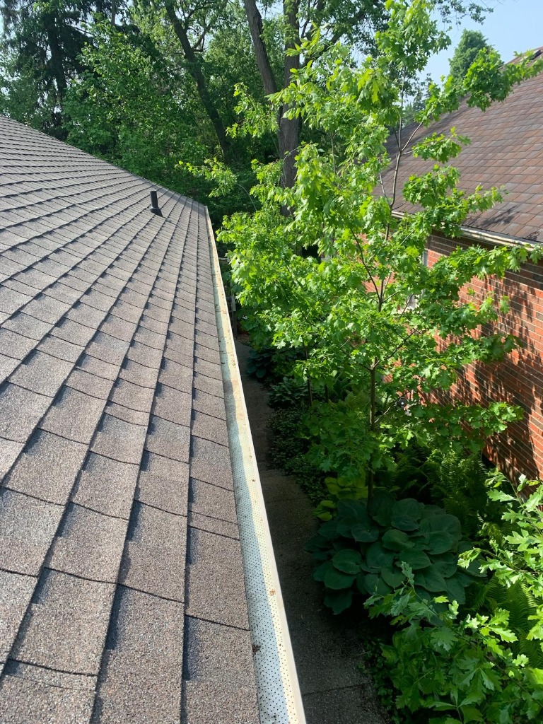 Clean eavestroughs on a London Ontario home after professional gutter cleaning service by Core Exteriors
